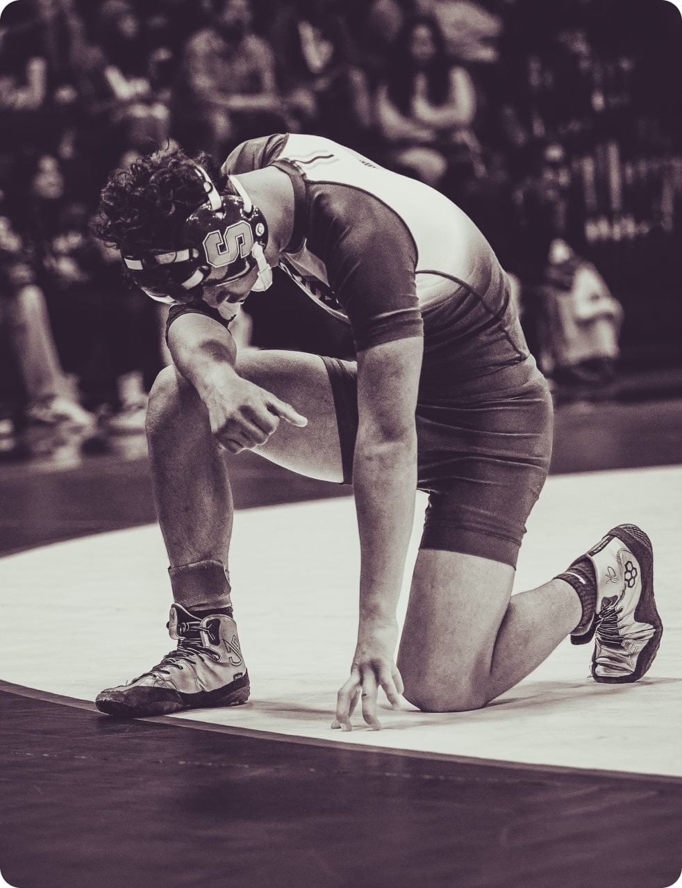 Athlete Kneeling Down
